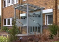 Bolted Glass Canopy with Telescopic Auto Doors